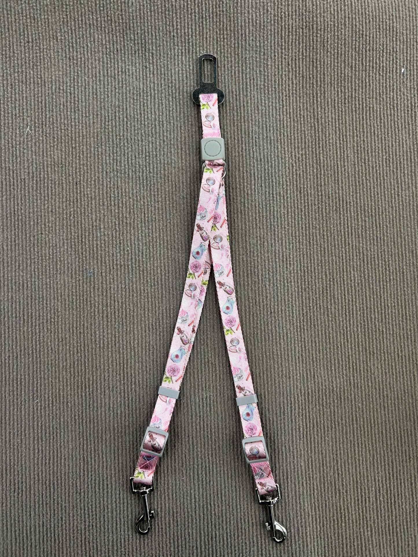 CINTURÓN DE SEGURIDAD ROSADO