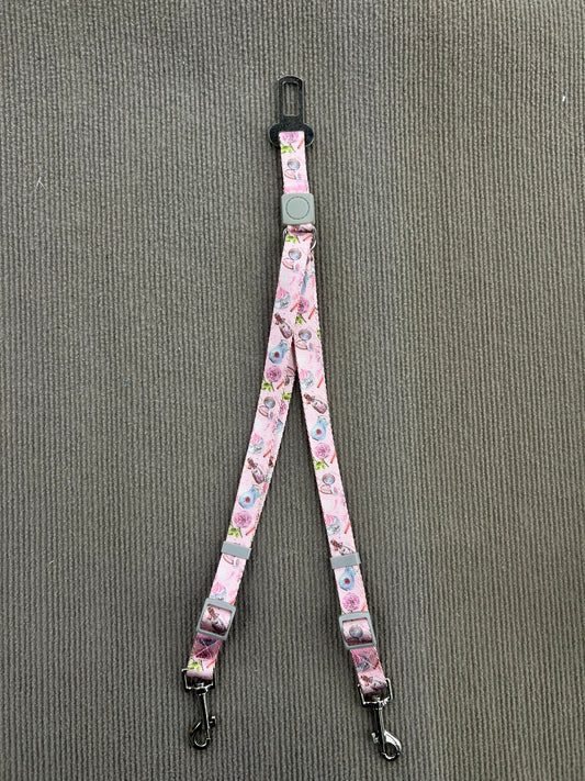 CINTURÓN DE SEGURIDAD ROSADO