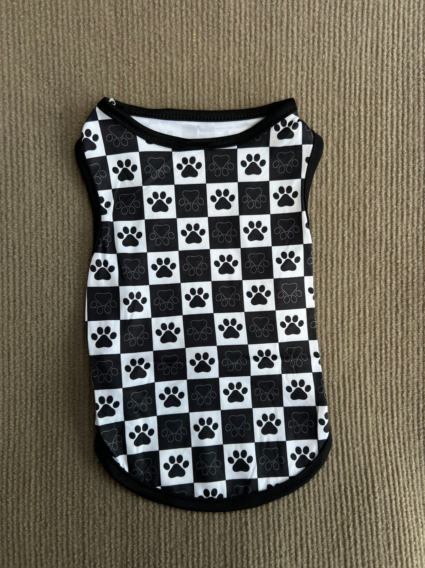 CAMISETA SIN MANGA HUELLITAS NEGRA